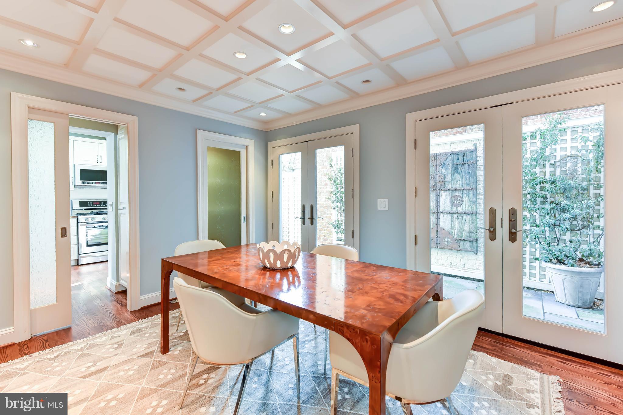 21 3rd Street Northeast Washington, DC 20002 - Photo 7 of 29 a dining room with furniture and wooden floor
