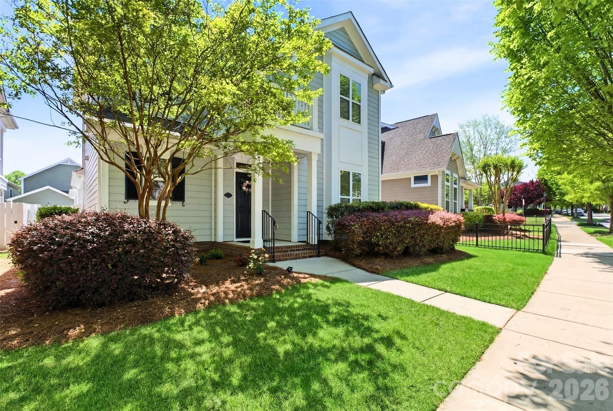 22237 Market Street Cornelius, NC 28031 - Photo 3 of 45 a view of a house with a garden