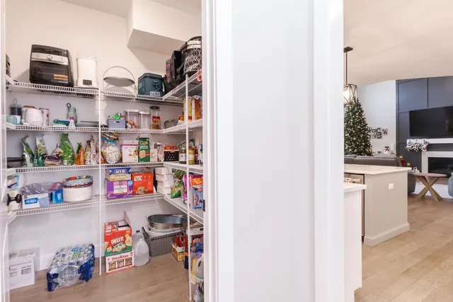 a room with a book shelf and a shelf