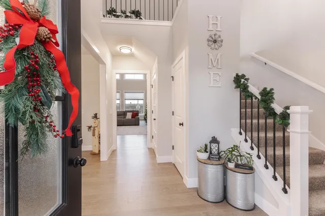 a view of a hallway with potted plants