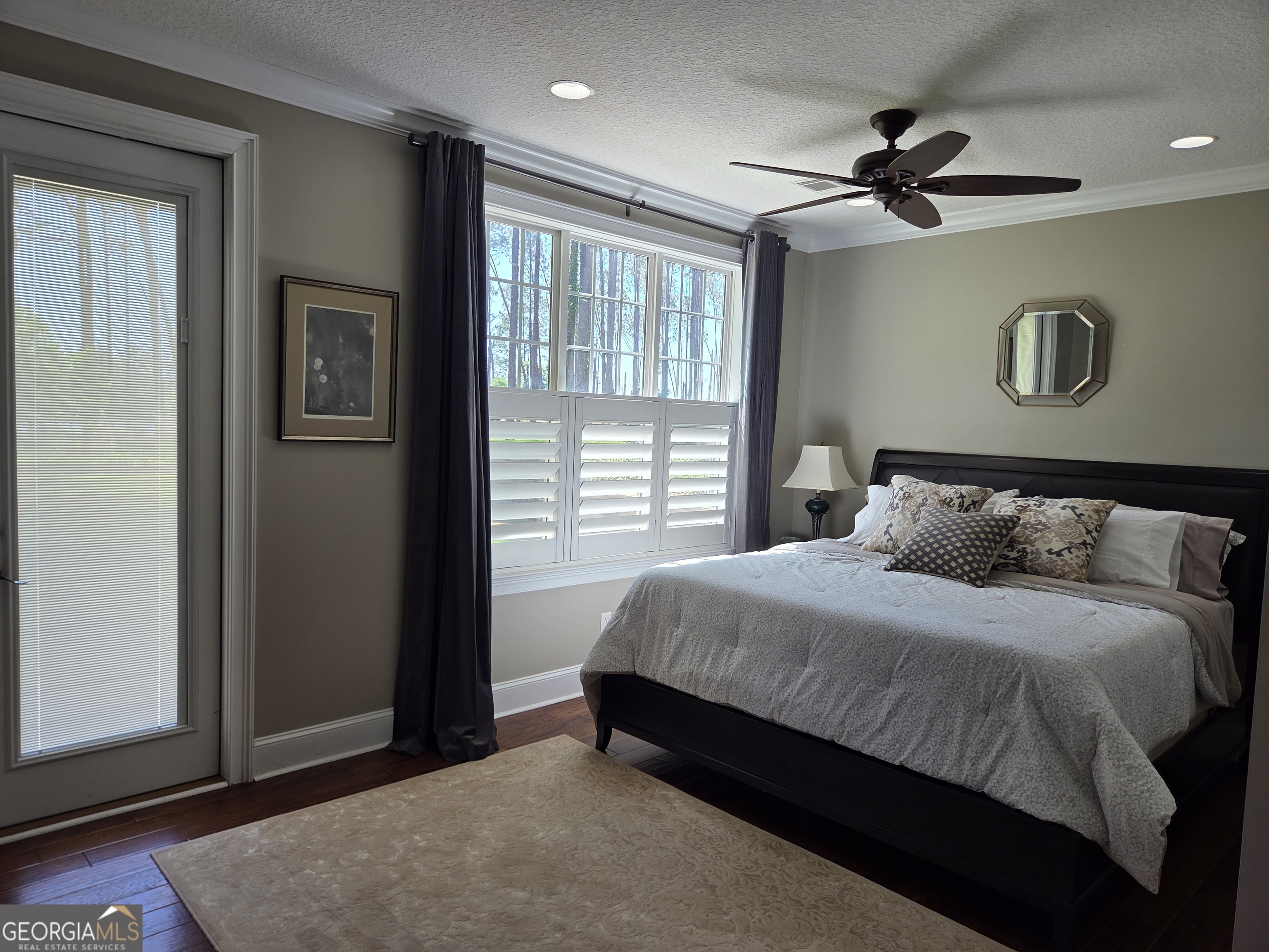 300 Hammond Powell Road Hazlehurst, GA 31539 - Photo 73 of 91 a bedroom with a large bed and a window