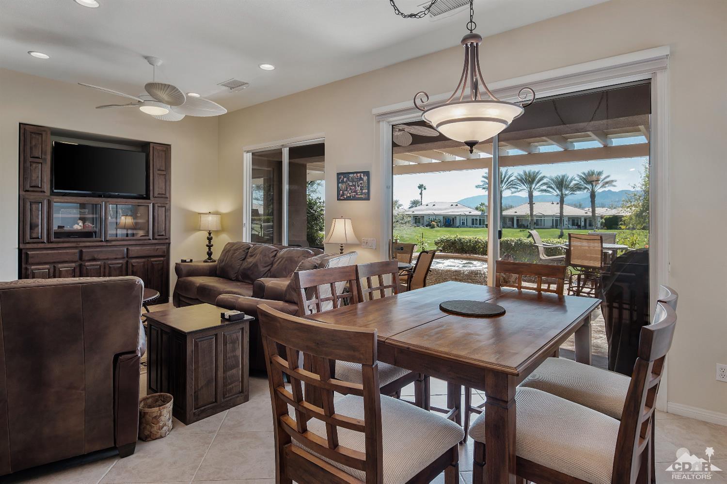 80557 Knightswood Road Indio, CA 92201 - Photo 13 of 30 a view of a dining room with furniture window and outside view