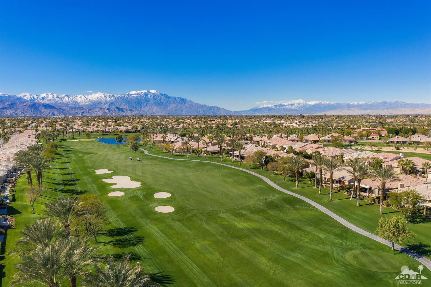 80557 Knightswood Road Indio, CA 92201 - Photo 4 of 30 a view of a lake with a city