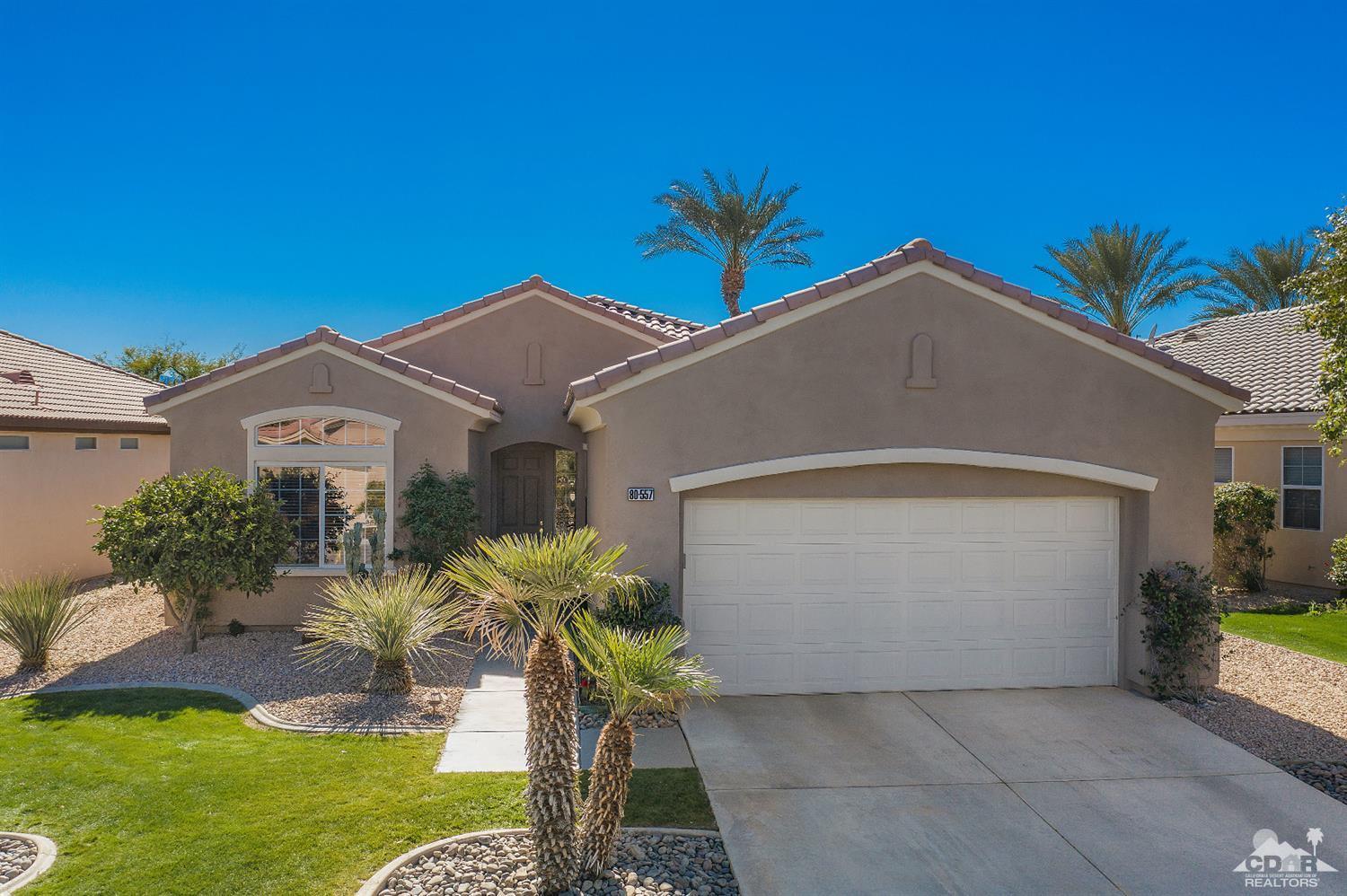 80557 Knightswood Road Indio, CA 92201 - Photo 7 of 30 a front view of a house with a yard