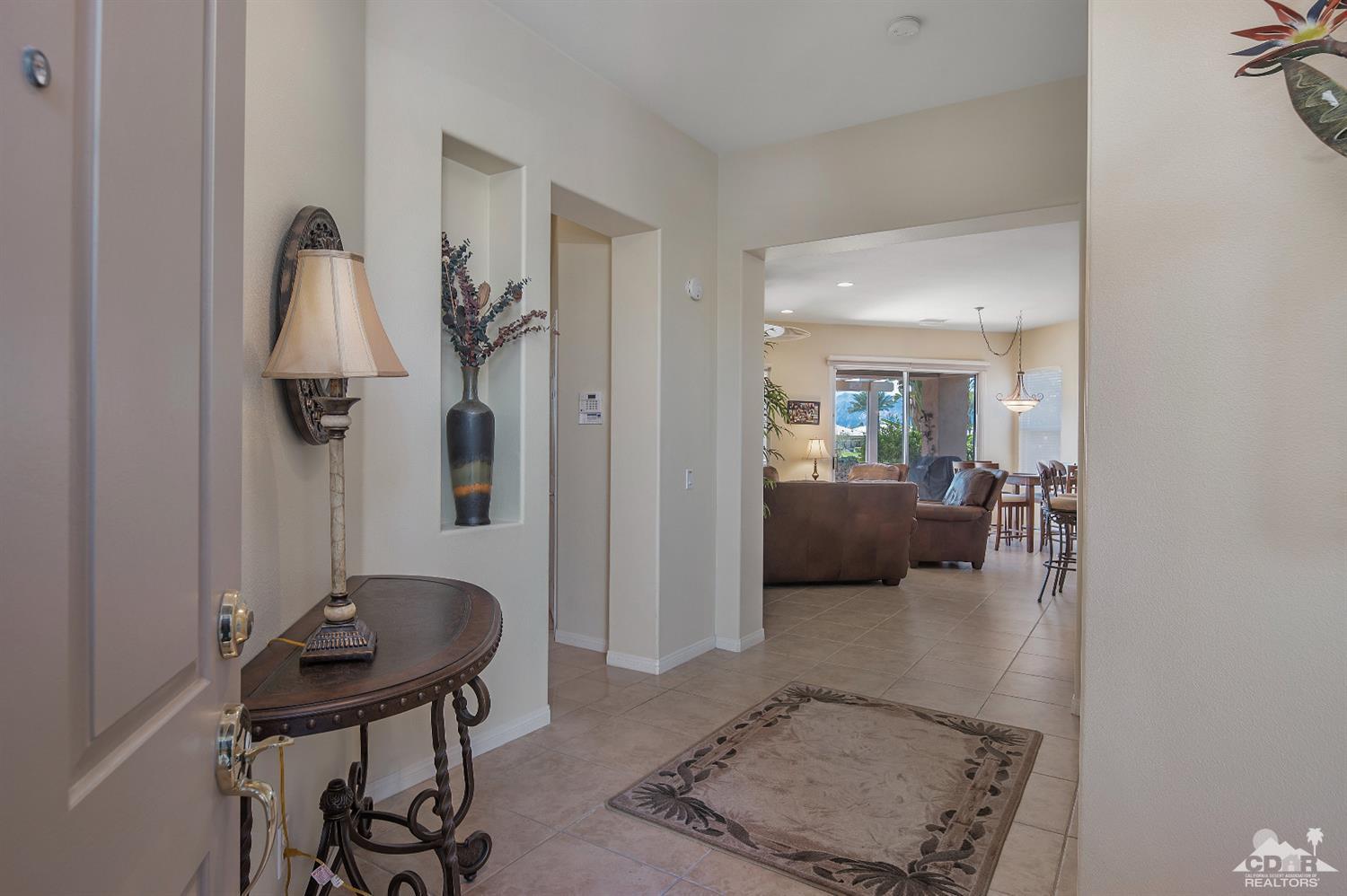 80557 Knightswood Road Indio, CA 92201 - Photo 9 of 30 a view of a livingroom with furniture and a couch