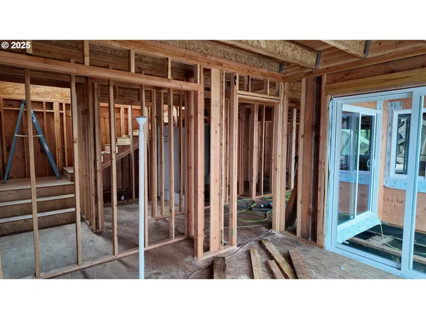 a black and white photo of a living room