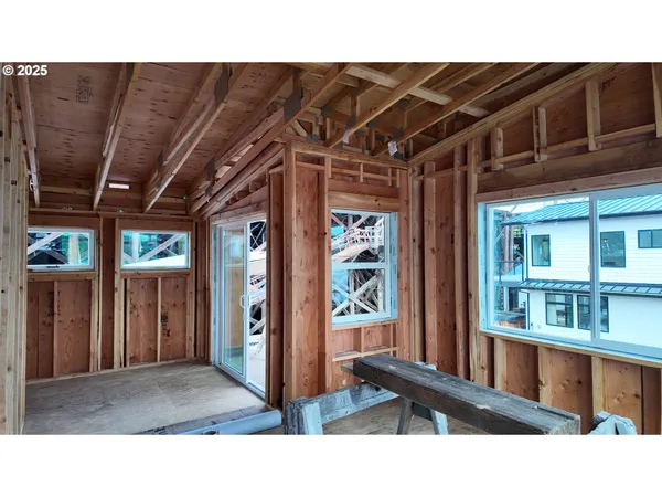 a black and white photo of a living room