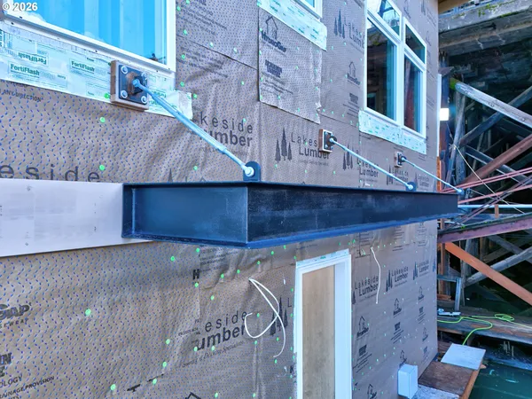 a view of a house with a street