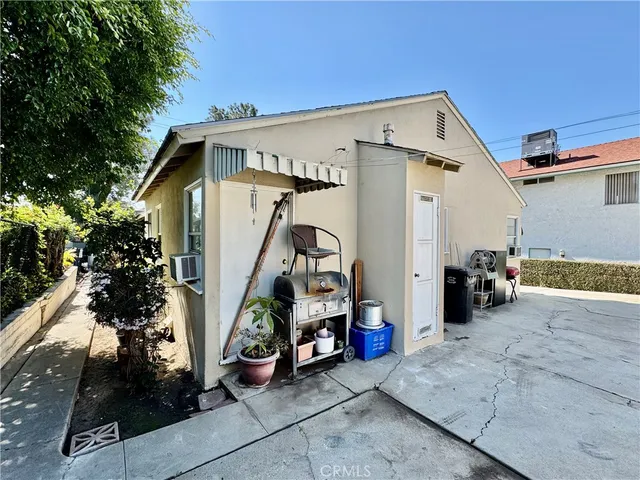 a view of a garage with parked cars