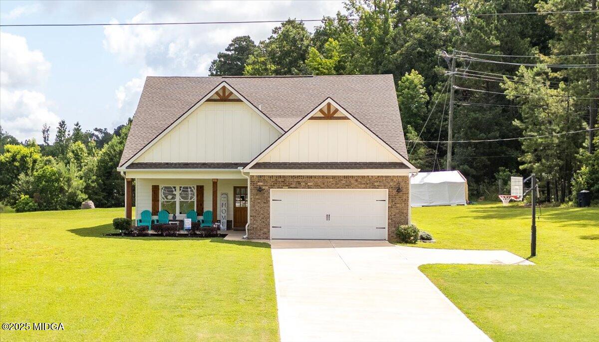309 Davis Road Gray, GA 31032 - Photo 27 of 48 a view of a house with a swimming pool