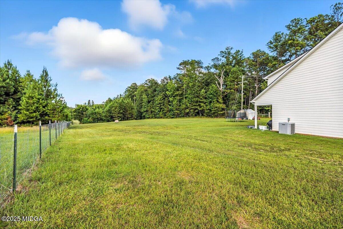 309 Davis Road Gray, GA 31032 - Photo 28 of 48 a view of a backyard