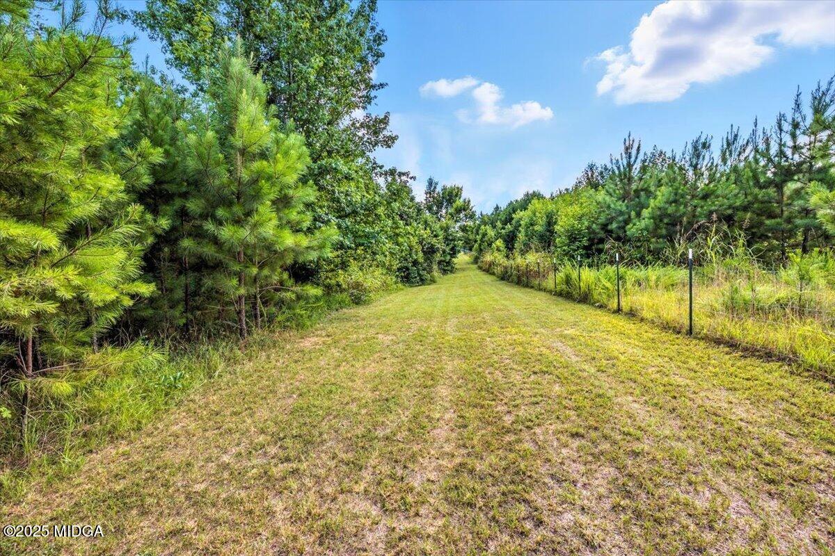 309 Davis Road Gray, GA 31032 - Photo 29 of 48 a view of outdoor space with a garden