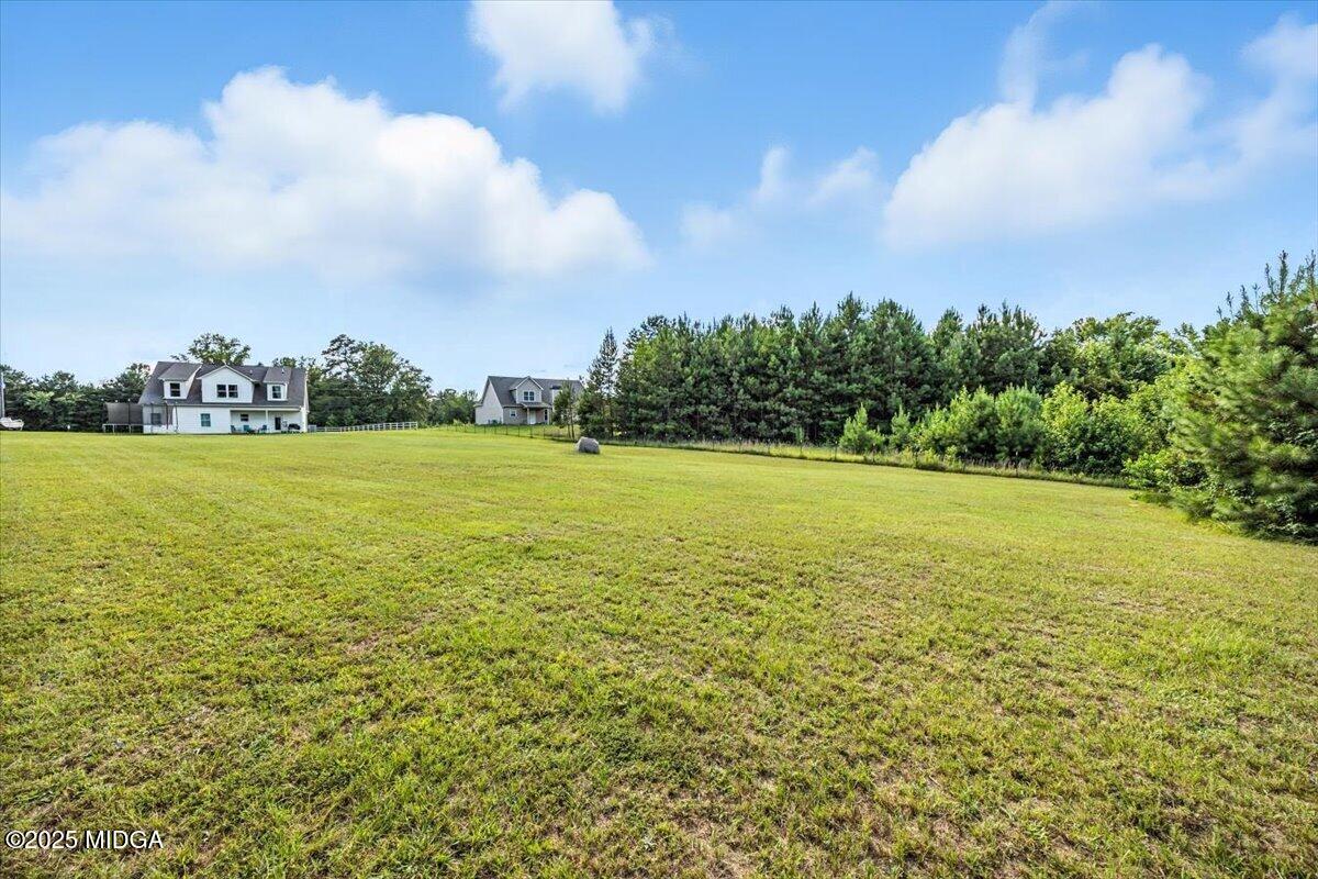 309 Davis Road Gray, GA 31032 - Photo 40 of 48 a view of a lake view with beach