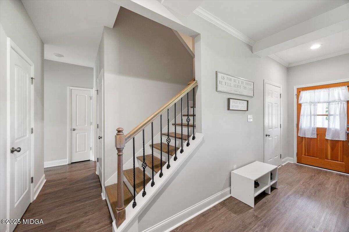 309 Davis Road Gray, GA 31032 - Photo 5 of 48 a living room with wooden floor and furniture