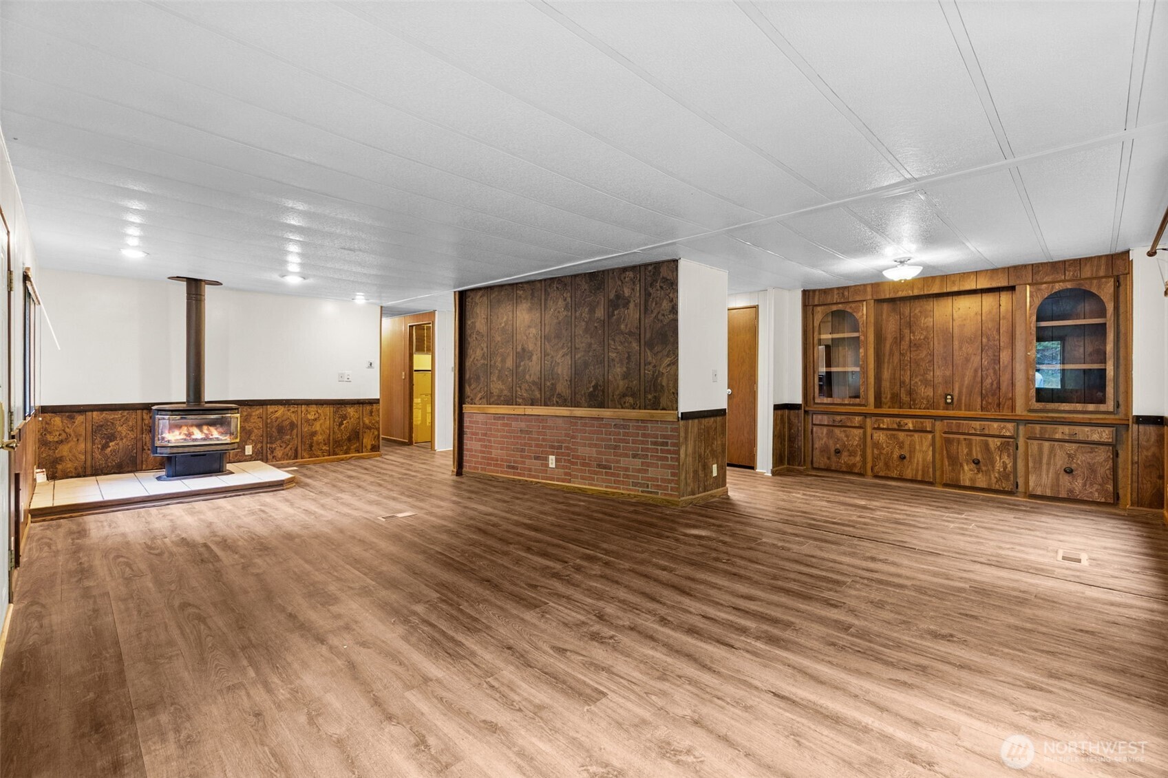 4312 Meridian Road Northeast Lacey, WA 98516 - Photo 10 of 21 a view of a livingroom with furniture and an empty room