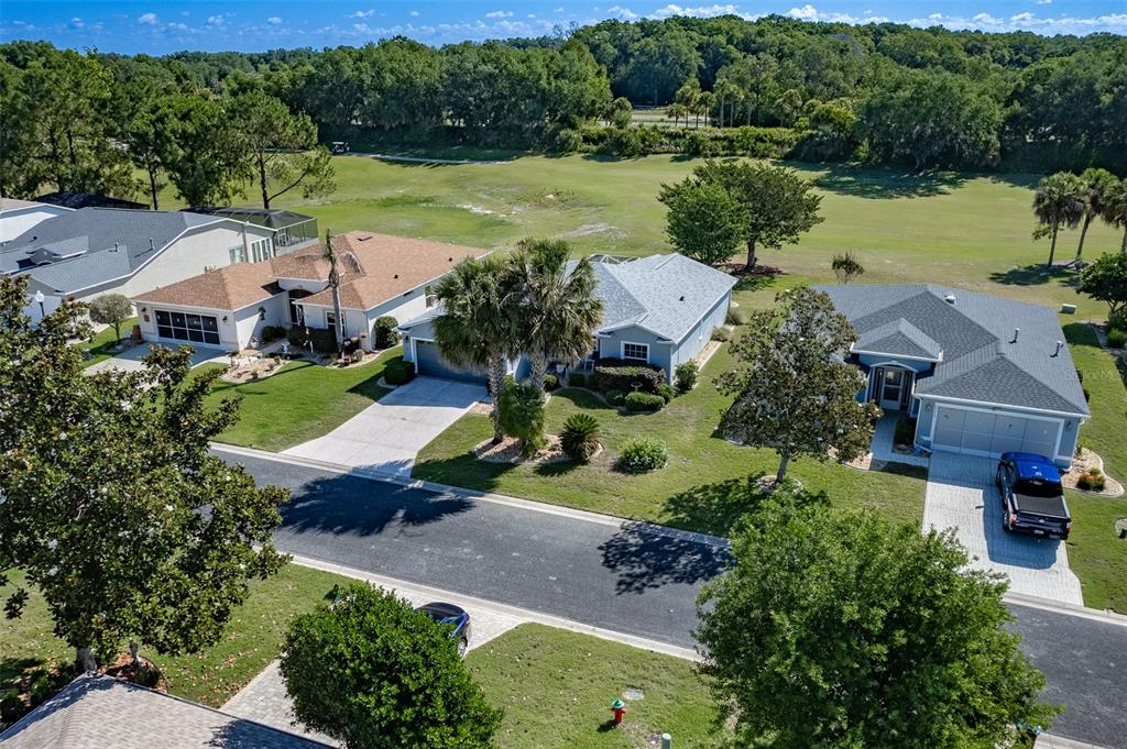 15143 Southwest 14th Avenue Road Ocala, FL 34473 - Photo 45 of 53 an aerial view of a house with garden space and a lake view