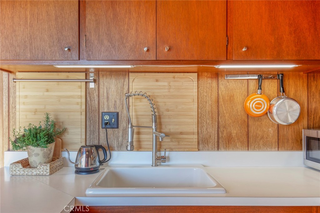 3105 Knob Street Nice, CA 95464 - Photo 14 of 36 a bathroom with a sink and a mirror