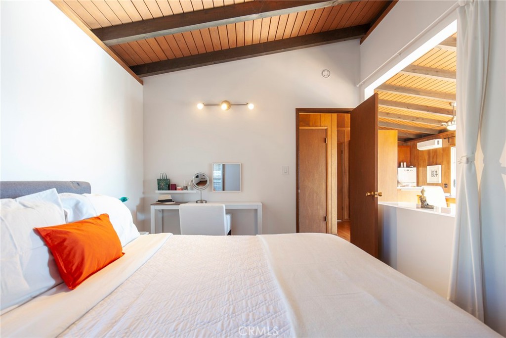 3105 Knob Street Nice, CA 95464 - Photo 18 of 36 a bedroom with a bed and a window