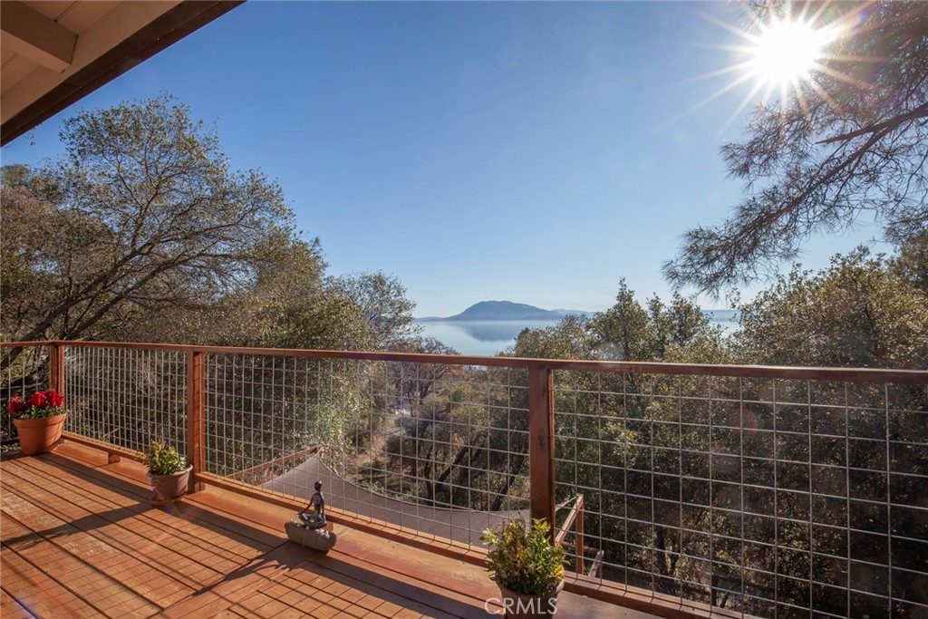 3105 Knob Street Nice, CA 95464 - Photo 27 of 36 a view of balcony with wooden floor and fence