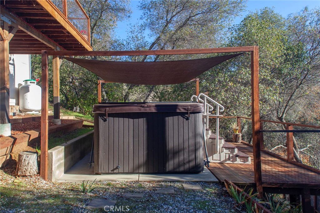 3105 Knob Street Nice, CA 95464 - Photo 30 of 36 a backyard of a house with barbeque oven