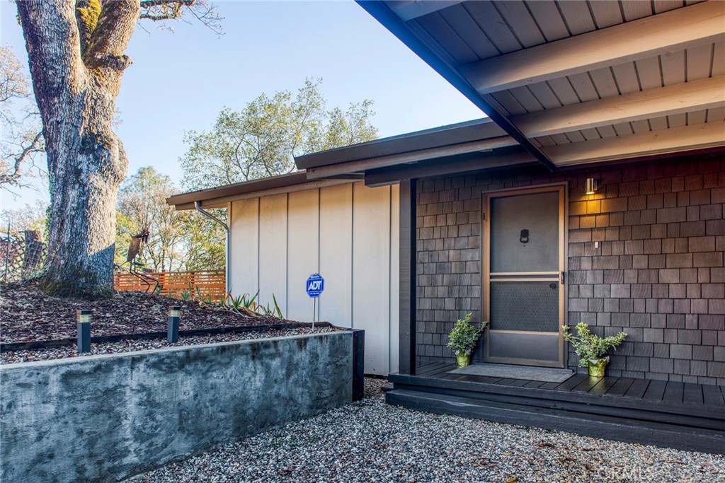 3105 Knob Street Nice, CA 95464 - Photo 32 of 36 a front view of a house with a yard