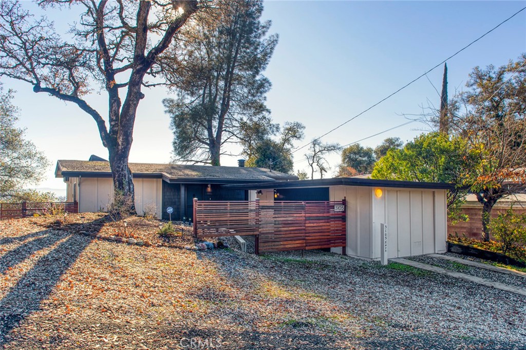 3105 Knob Street Nice, CA 95464 - Photo 36 of 36 a front view of a house with a yard and a wooden fence