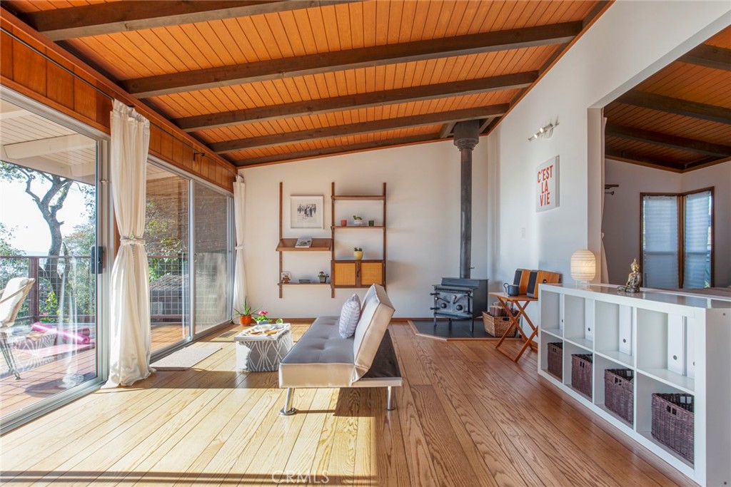3105 Knob Street Nice, CA 95464 - Photo 4 of 36 a outdoor space with lots of furniture and wooden floor