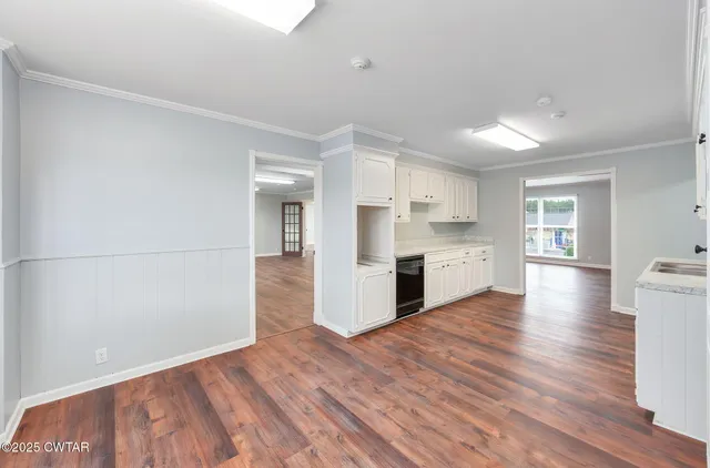 a view of kitchen with wooden floor