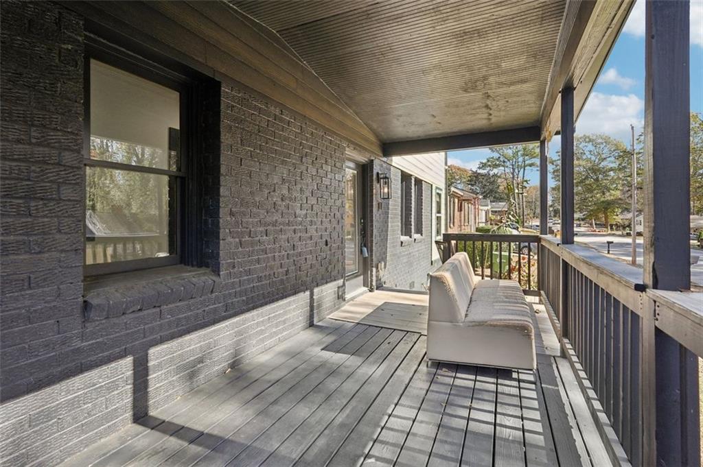 1689 Derry Avenue Southwest Atlanta, GA 30310 - Photo 3 of 51 a balcony with wooden floor