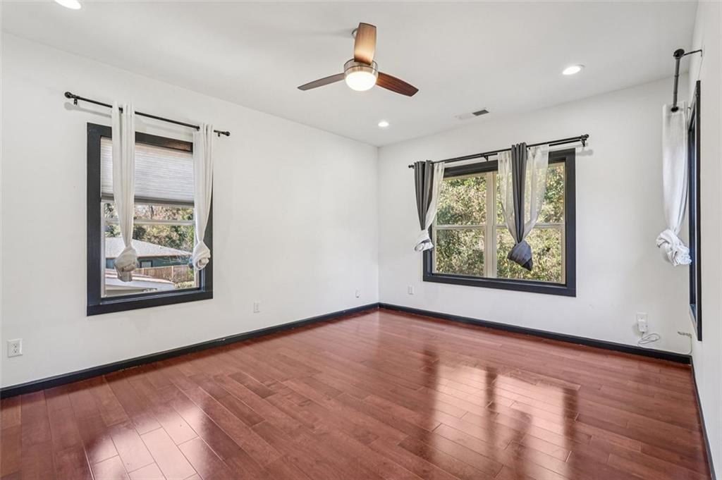 1689 Derry Avenue Southwest Atlanta, GA 30310 - Photo 39 of 51 a view of an empty room with window and wooden floor