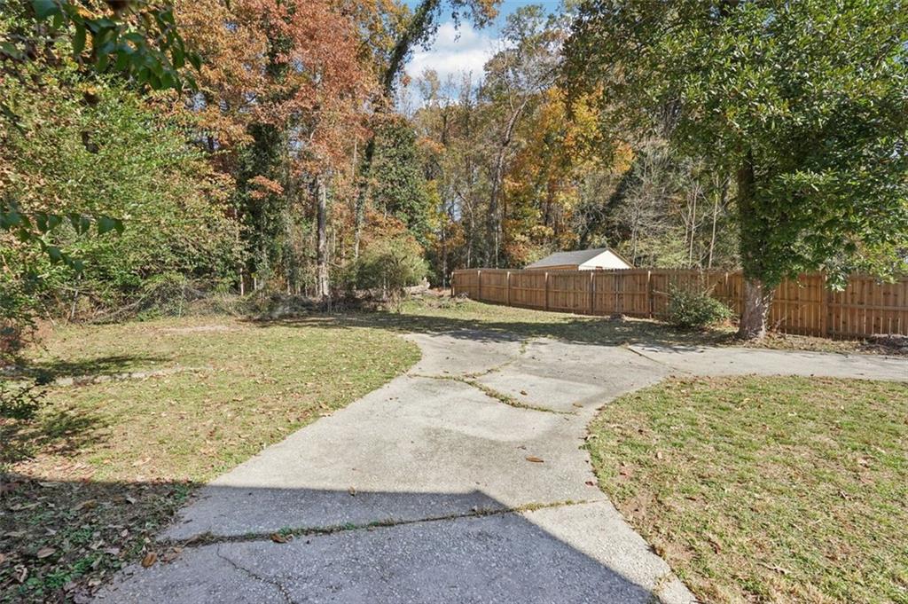 1689 Derry Avenue Southwest Atlanta, GA 30310 - Photo 49 of 51 a view of a yard with large trees