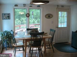 3015 Swamp Road Doylestown, PA 18902 - Photo 3 of 6 a view of a dining room with furniture window and outside view