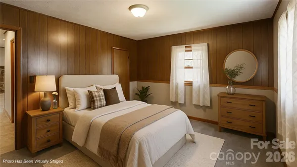 a bed room with a bed and a closet