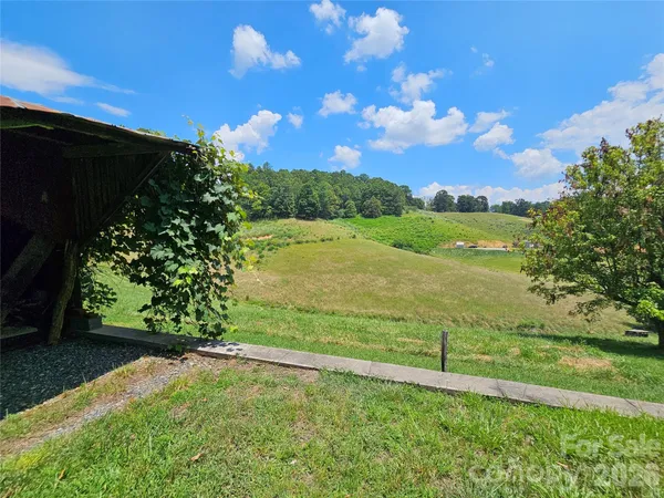 a view of a yard with an outdoor space