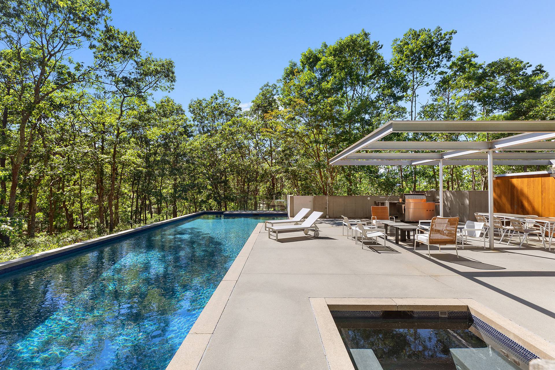 1052 Noyac Path Water Mill, NY 11976 - Photo 3 of 35 swimming pool view with a seating space