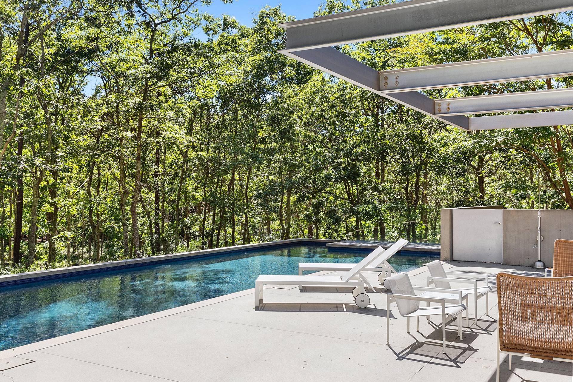 1052 Noyac Path Water Mill, NY 11976 - Photo 31 of 35 a view of a patio with a table and chairs