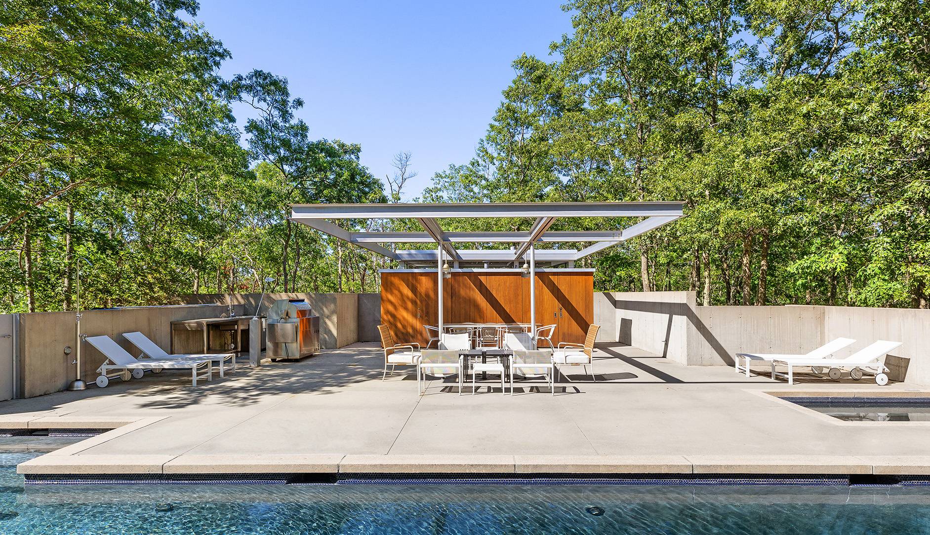1052 Noyac Path Water Mill, NY 11976 - Photo 32 of 35 a view of backyard with swimming pool