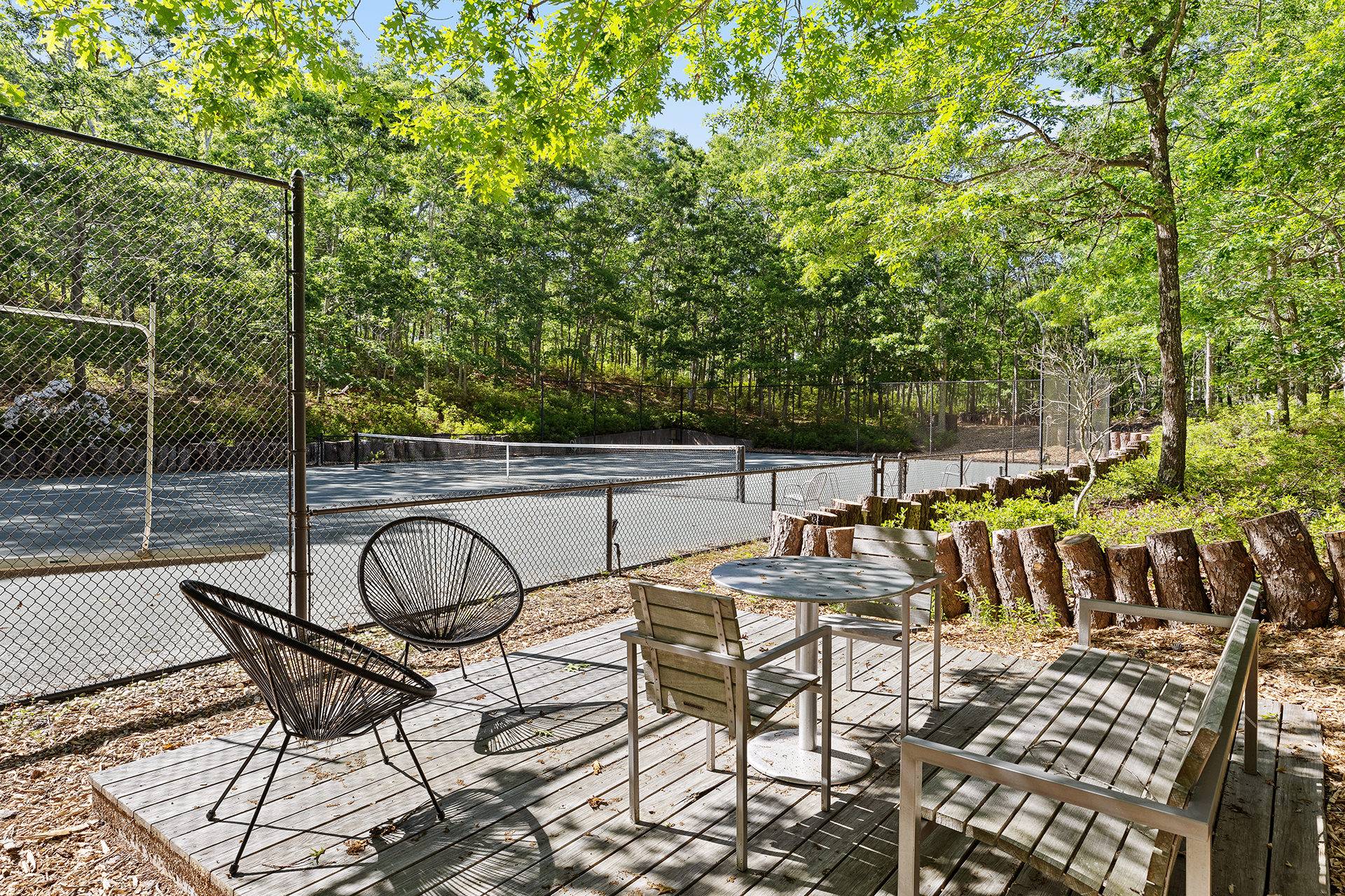 1052 Noyac Path Water Mill, NY 11976 - Photo 33 of 35 a view of a chairs and table on the patio