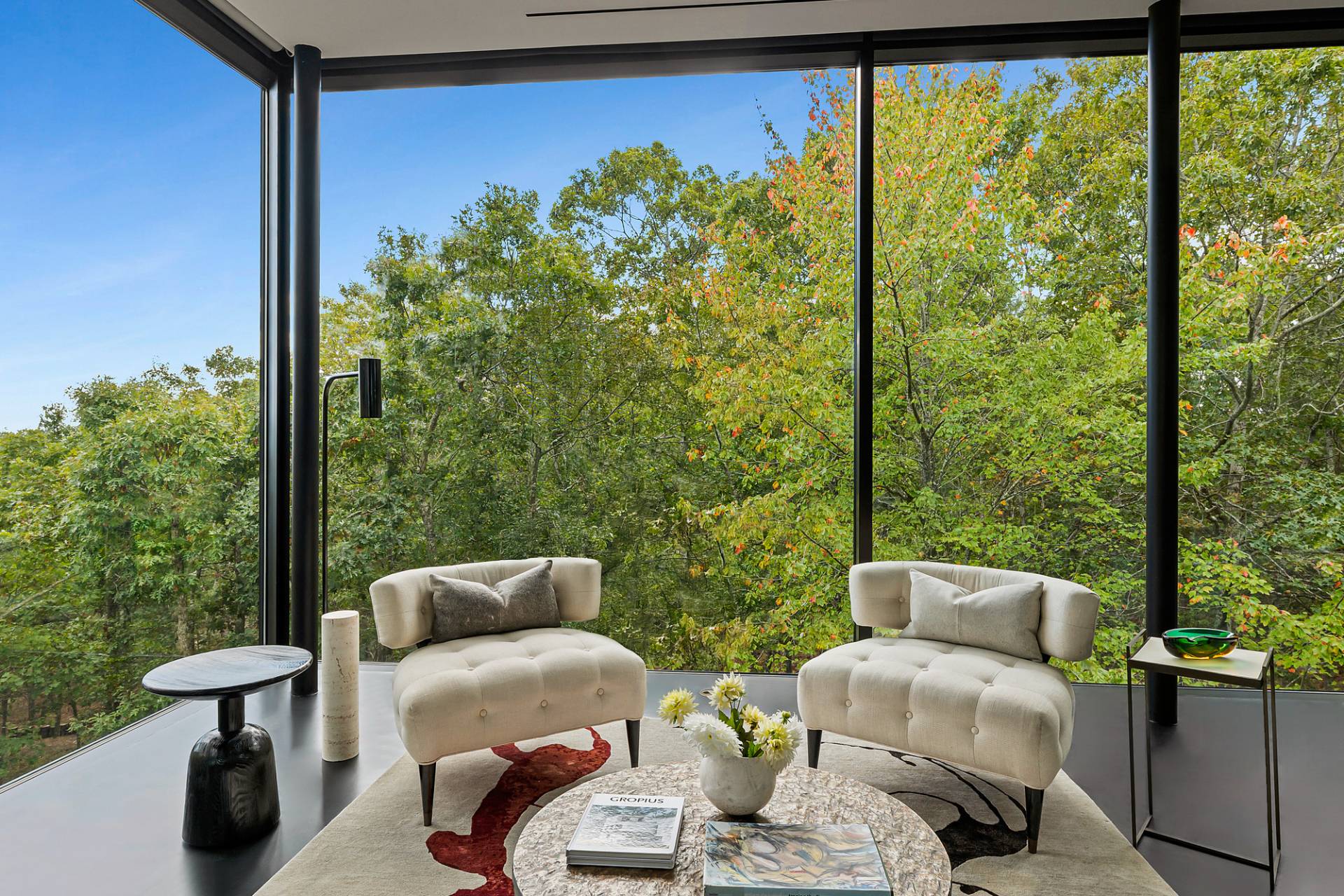 1052 Noyac Path Water Mill, NY 11976 - Photo 8 of 35 a balcony with couple of chairs and a large window