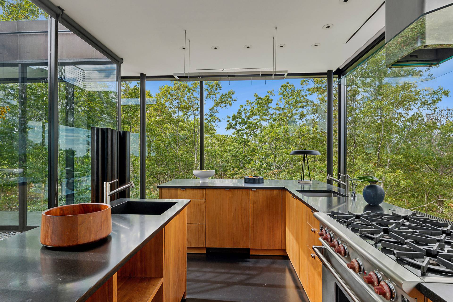 1052 Noyac Path Water Mill, NY 11976 - Photo 10 of 35 a kitchen with sink a large window and stainless steel appliances