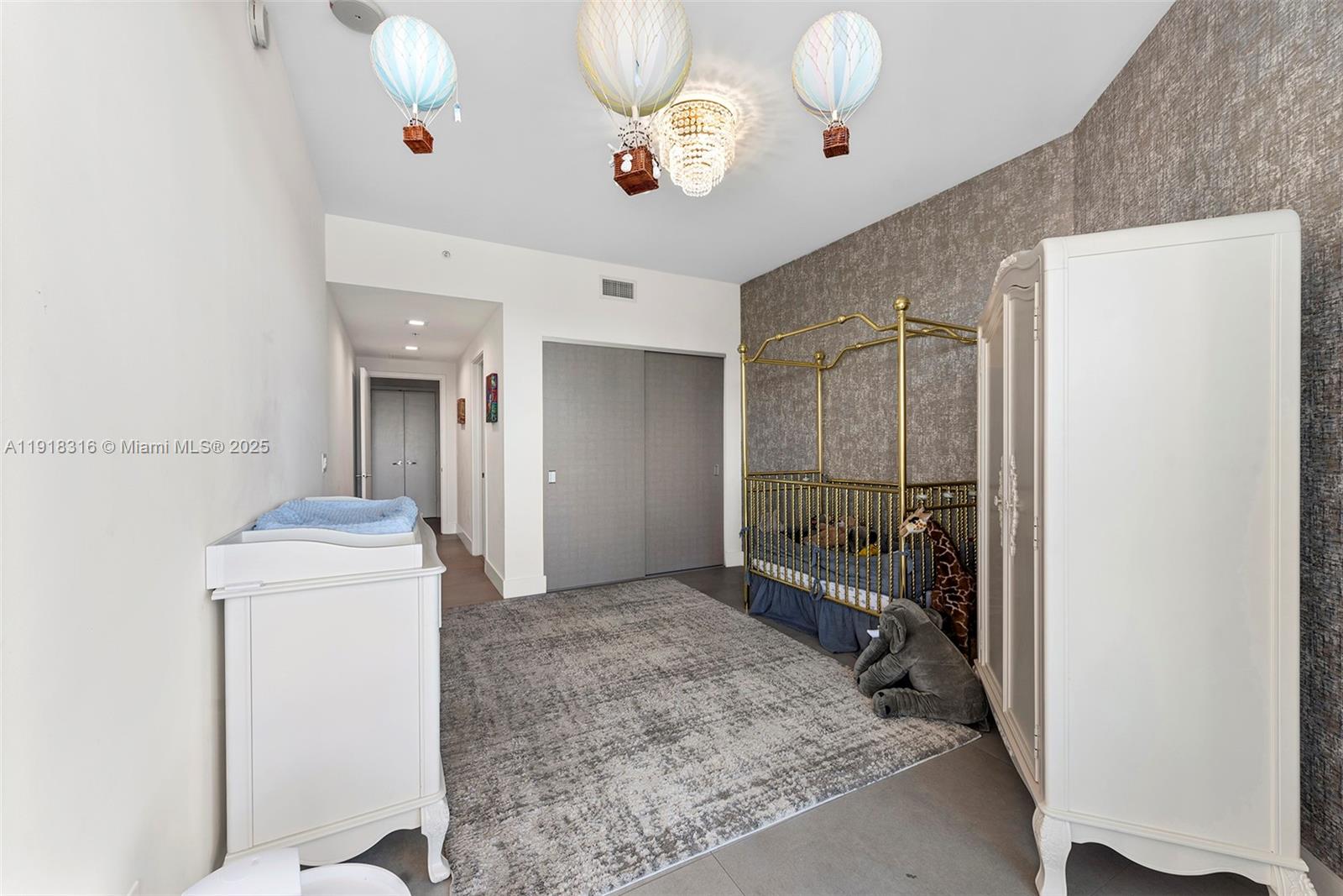 17111 Biscayne Boulevard, Unit 606 North Miami Beach, FL 33160 - Photo 26 of 36 a very nice looking room with a large window