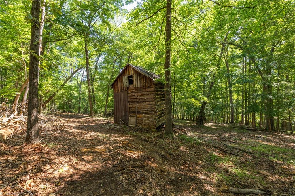 7289 Plunkett Road Stokesdale, NC 27357 - Photo 11 of 27 Tobacco Barn on property