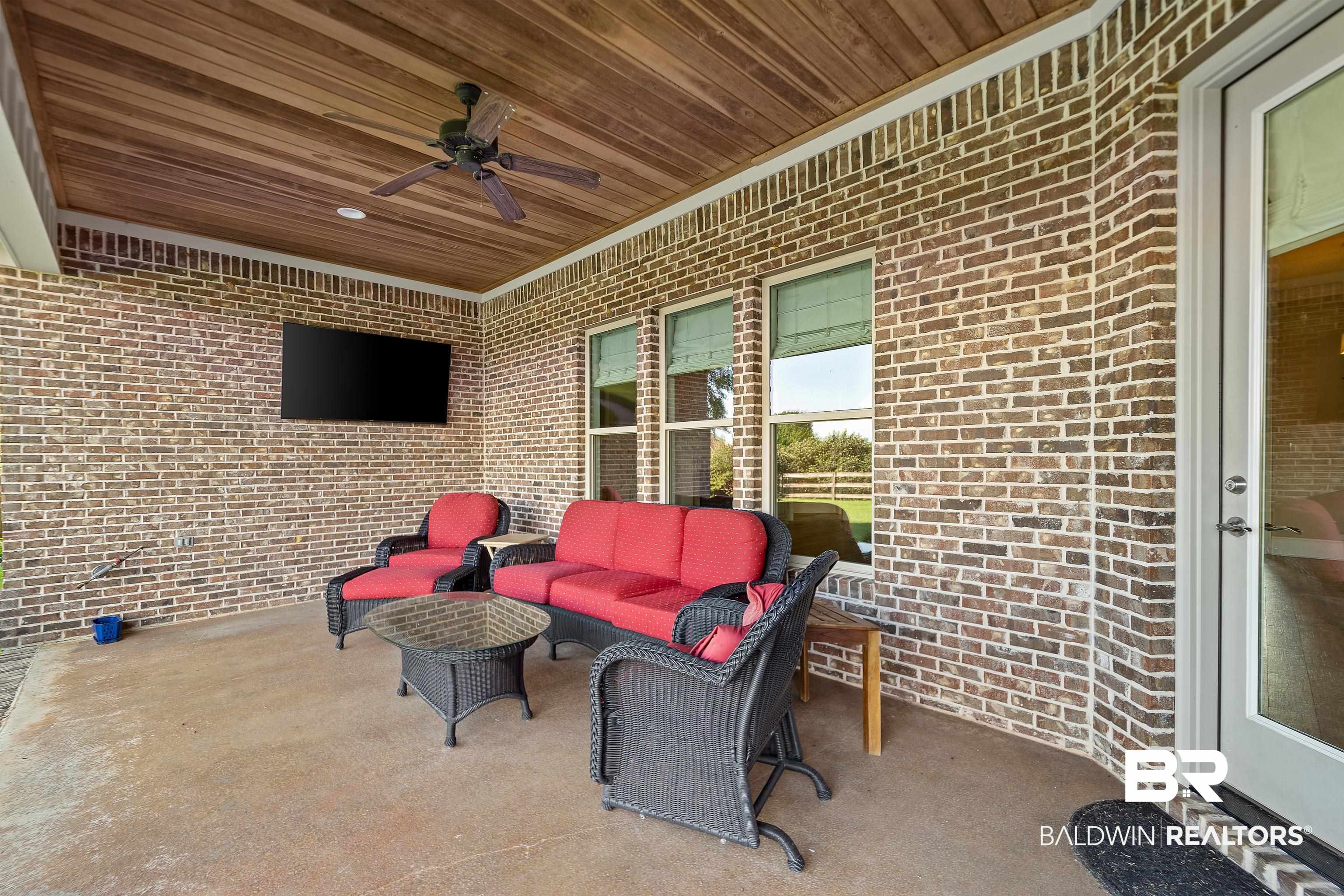 17663 Burwick Loop Fairhope, AL 36532 - Photo 35 of 41 View of patio with an outdoor living space and ceiling fan