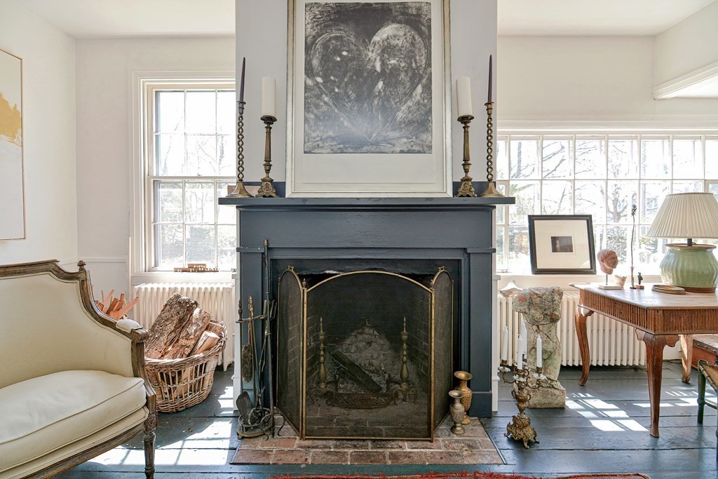 1904 Main Road Westport, MA 02791 - Photo 11 of 42 a living room with furniture and a fireplace