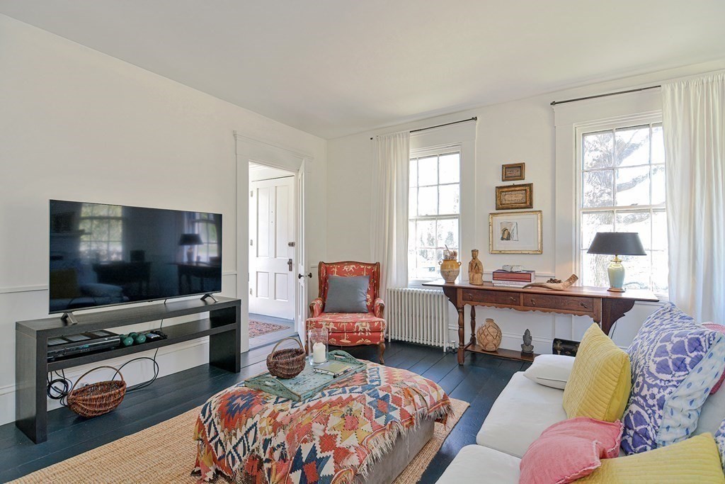 1904 Main Road Westport, MA 02791 - Photo 15 of 42 a living room with furniture and a flat screen tv