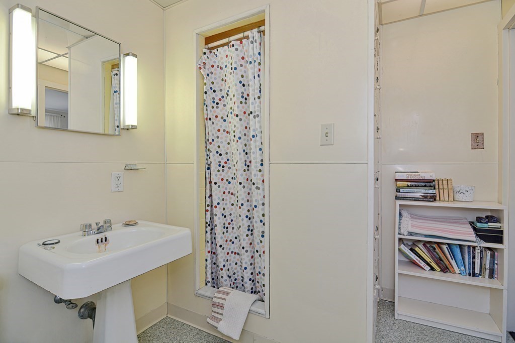 1904 Main Road Westport, MA 02791 - Photo 17 of 42 a bathroom with a sink and a shower