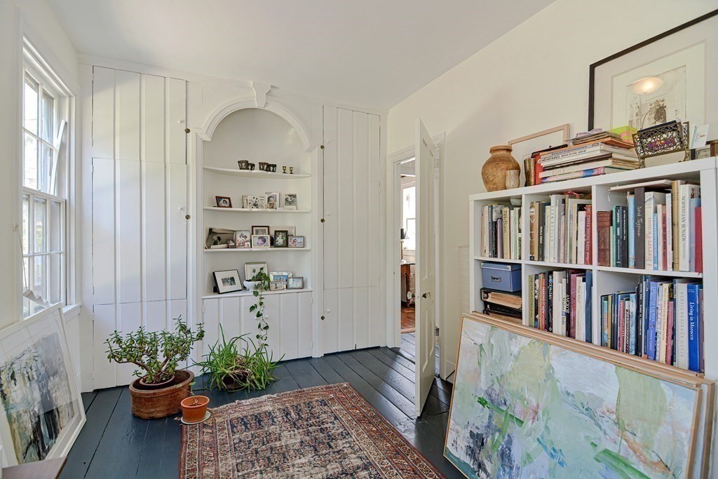 1904 Main Road Westport, MA 02791 - Photo 18 of 42 a view of a livingroom with a book shelf