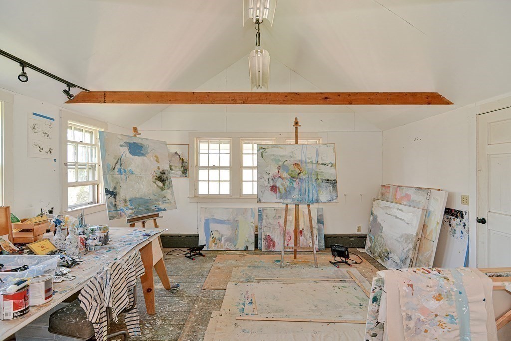 1904 Main Road Westport, MA 02791 - Photo 23 of 42 a bedroom with furniture and a bed