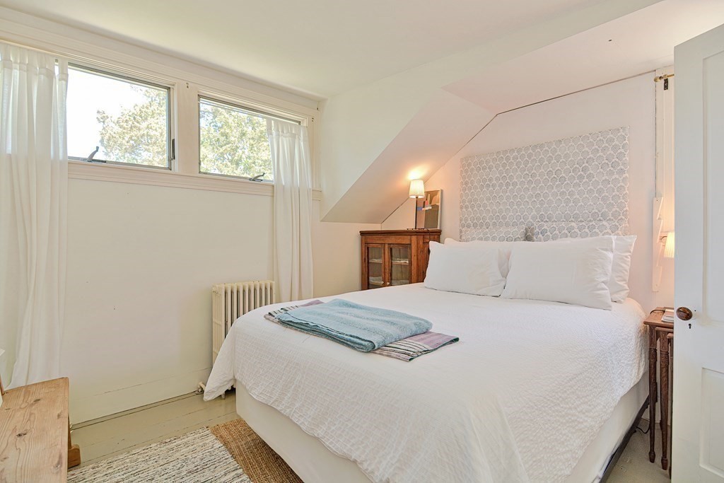 1904 Main Road Westport, MA 02791 - Photo 29 of 42 a bedroom with a bed and a window