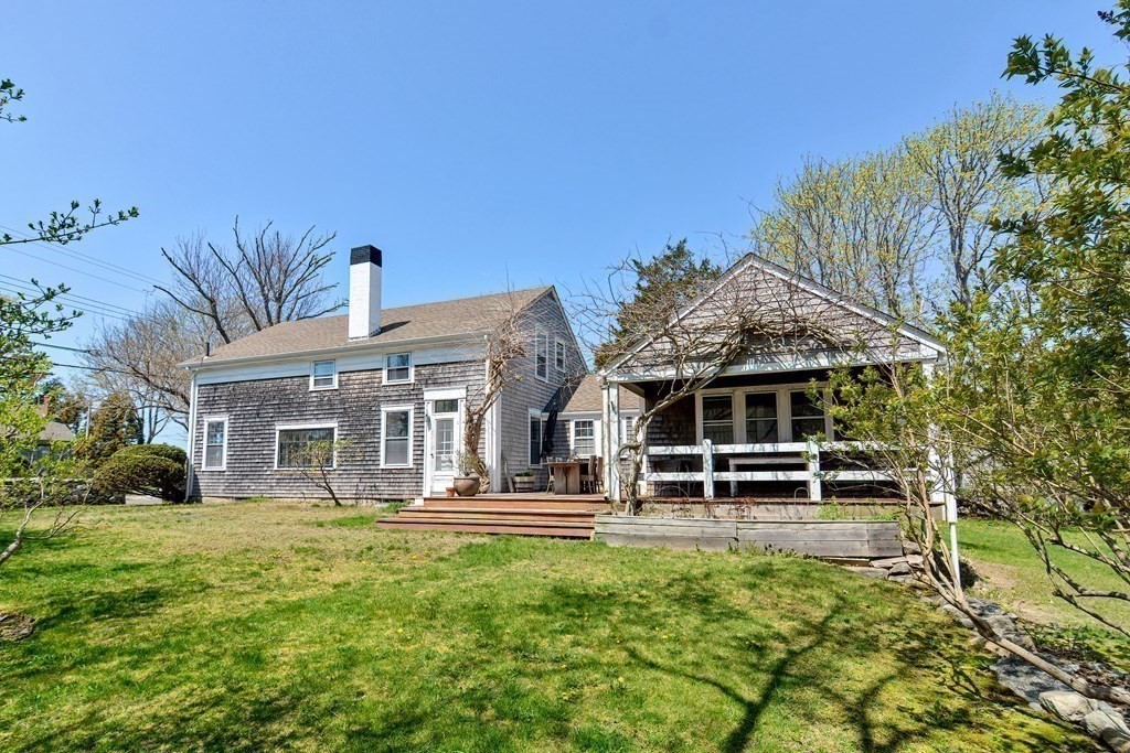 1904 Main Road Westport, MA 02791 - Photo 34 of 42 a front view of a house with a garden